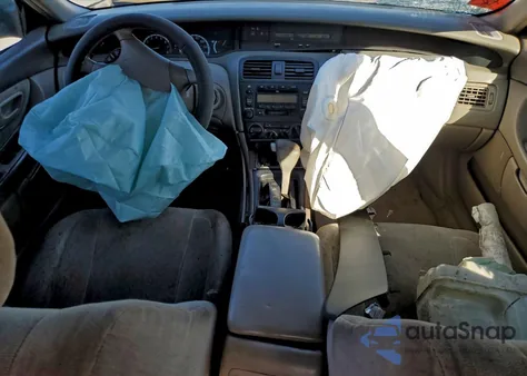 2000 Toyota Avalon Xl z USA, uszkodzony, nr VIN 4T1BF28B2YU004656